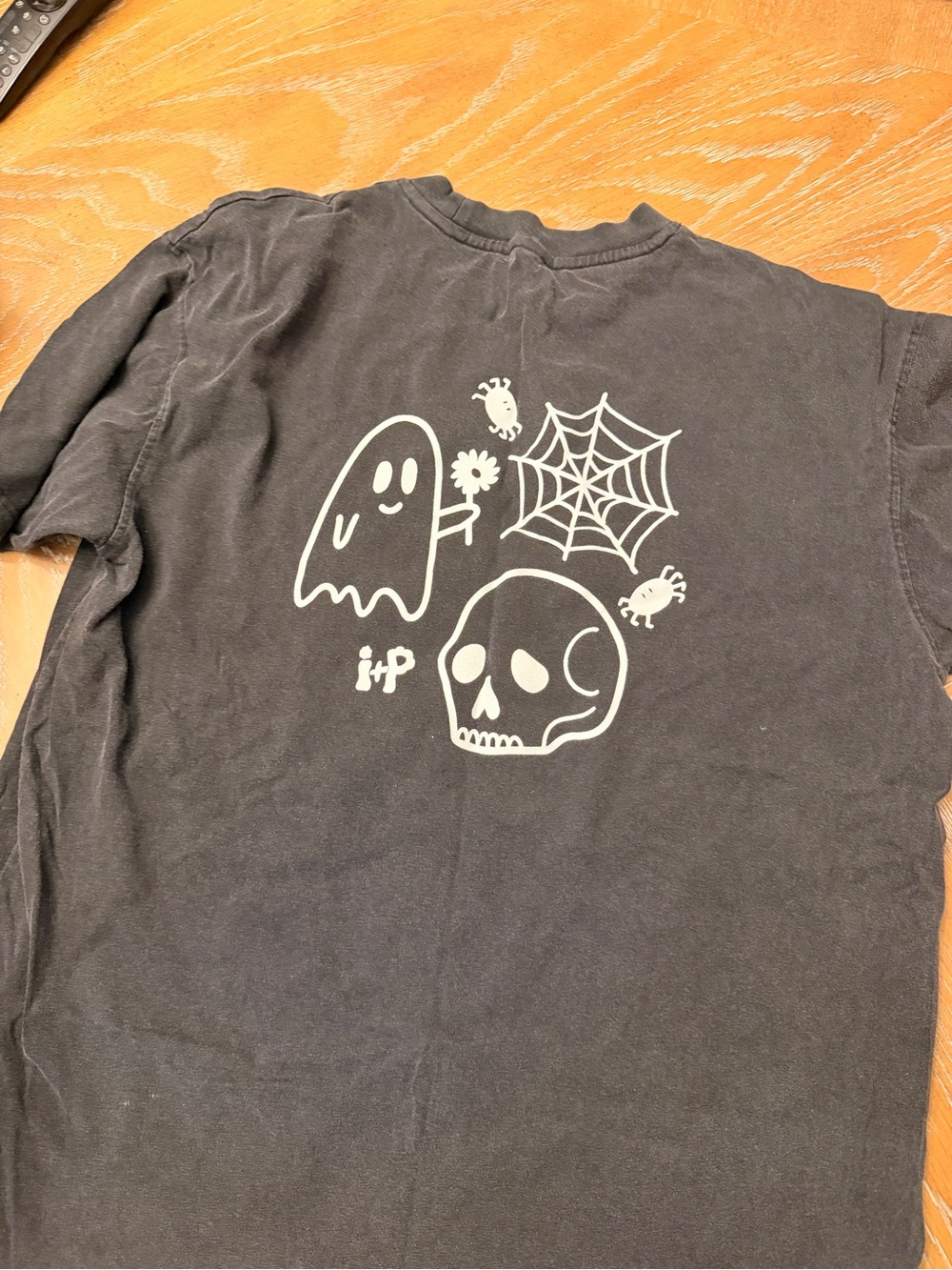 Black Short-Sleeve Graphic Tee with Ghost & Skull Motif